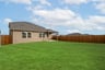 backyard with grass and covered patio