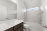 guest bathroom with soaking tub