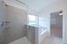 primary bathroom with soaking tub and walk-in shower