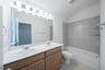 guest bathroom with soaking tub