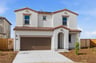 front exterior of white and brown two-story spanish style home