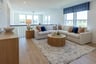 2nd-floor loft with a sectional couch
