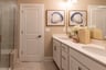primary bath with dual vanities