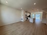 great room with access to the kitchen