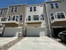 three-story townhome rear exterior