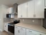kitchen with white cabinets