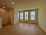 great room with three windows
