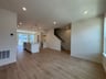 great room with access to the kitchen