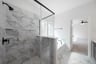 primary bathroom with soaking tub and walk-in shower
