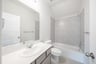 guest bathroom with soaking tub