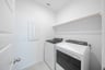 laundry room with included washer and dryer