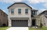 two-story home with brick and stone exterior