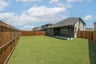backyard with grass and covered patio