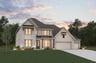 home exterior with 3-car garage and brick 
