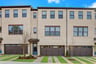 front of townhome with brick 