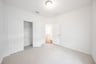 guest bedroom with carpet