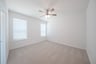primary bedroom with carpet