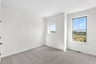 secondary bedroom with carpet