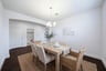 spacious dining room with hardwood flooring
