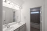 bathroom with two sinks and white countertops 