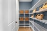 walk-in pantry with wire shelves
