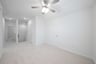 gameroom with carpet and ceiling fan