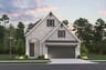 home with rock, windows, garage and landscaping