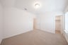 bedroom with carpet and closet 