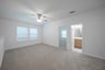 game room with windows and window blinds 