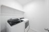 laundry room with washer and dryer