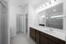primary bathroom with soaking tub and walk-in shower