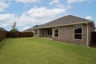 backyard of home with covered patio