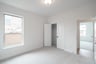 guest bedroom with carpet