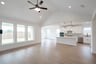 open great room with hardwood flooring
