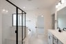 primary bathroom with soaking tub and shower