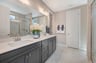 primary bath with two sinks