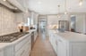 kitchen with access to the dining room