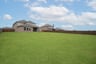 backyard with grass and covered patio