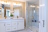 primary bath with dual vanities