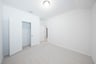 guest bedroom with carpet