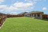 backyard with grass and covered patio
