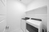 laundry room with included washer and dryer