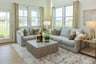 great room with seating and an abundance of natural light