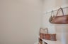 mudroom with a bench and hooks