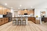 kitchen with center island and wood-finish cabinets