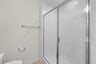 secondary bath with an oversized shower