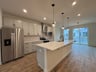 kitchen with a view of the dining area