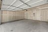 2-car garage with space for cars and storage