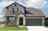 two-story home with brick and stone exterior