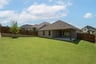 backyard with grass and covered patio